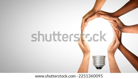 Symbols and shapes of light bulbs created by hand. People thinking together and team ideas coming together joining hands. The concept of idea, cooperation, teamwork and creative solution. Royalty-Free Stock Photo #2251360095