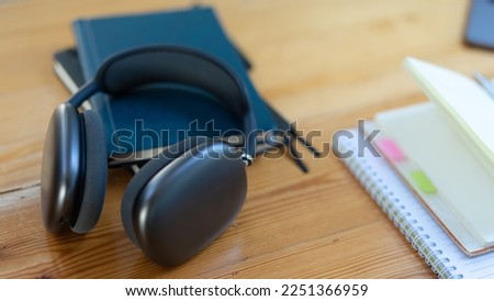 Laptop, tablet , smartphone and coffee cup with financial docume