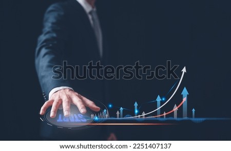 start up business concept, planning and strategy, Stock market, Business growth, progress or success concept. Businessman or trader is showing a growing virtual hologram stock, invest in trading.