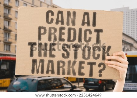 The question " Can AI Predict the Stock Market? " is on a banner in men's hands with blurred background. Knowledge. Labor. Cyberspace. Action. Efficiency. Job. Net. Effective. Occupation. Virtual