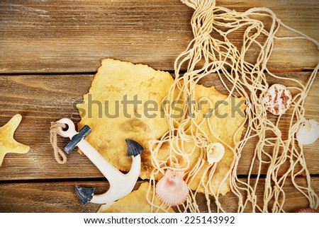 Decor of seashells on wooden background