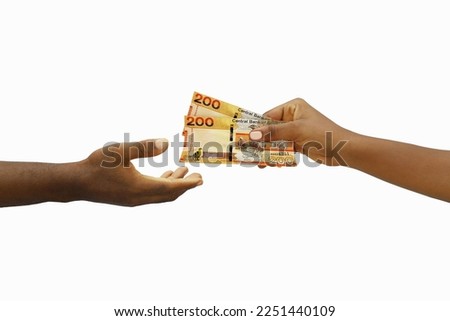 Hand giving 3D rendered Gambian Dalasi notes to another hand. Hand receiving money Royalty-Free Stock Photo #2251440109