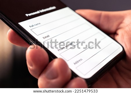 Form to register online data with phone to digital web survey or questionnaire. Registration to website with smartphone. Personal info text in application or contract. Name, email and cellphone number Royalty-Free Stock Photo #2251479533