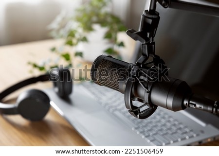 home studio for podcast recording, radio broadcasting. workplace of content creator. microphone closeup