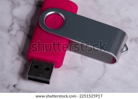 Usb Stick in front of white plate close up