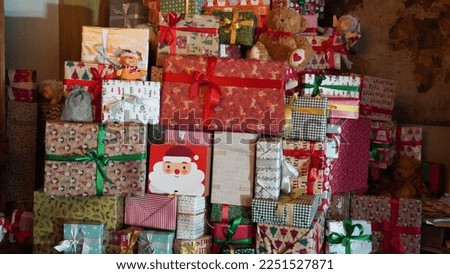 Lots of decorated Christmas presents. Christmas and other holidays concept.