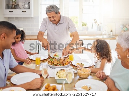 Family lunch, home celebration and grandparents hosting a dinner at kitchen table for children with turkey chicken. Girl kids, father and senior people eating food together with love in their house