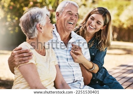 Woman, grandparents and hug for family summer vacation, holiday or break together in the outdoors. Happy grandma, grandpa and daughter with smile in joyful happiness, love or care for elderly parents Royalty-Free Stock Photo #2251530401