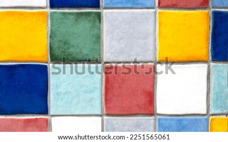 Wall with rows of colorful square tiles as background Royalty-Free Stock Photo #2251565061