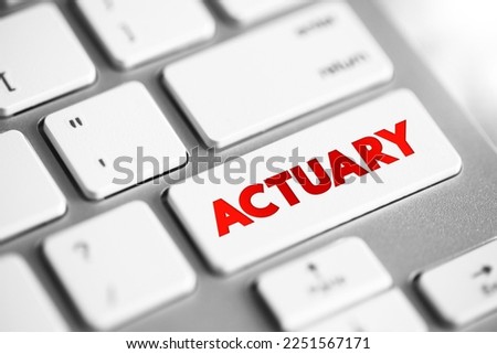 Actuary - business professional who deals with the measurement and management of risk and uncertainty, text concept button on keyboard Royalty-Free Stock Photo #2251567171