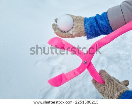 pink snowball maker make balls out of snow. accessories and toys for winter games.