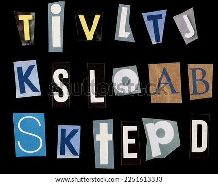 Set letters newspapers isolated on black background and texture, top view, clipping path