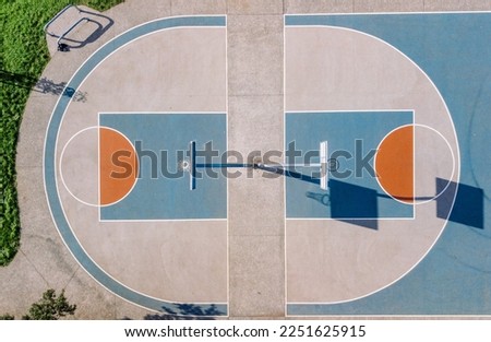 Outdoor basketball court aerial shot from a drone