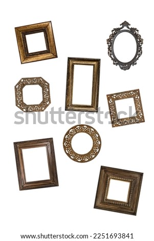 Gallery wall with a variety of antique frames isolated cutout on white background