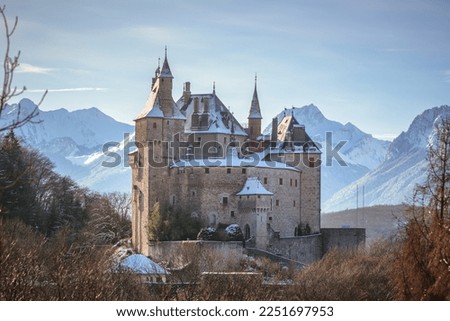 The castle of Menthon Saint Bernard on a winter morning