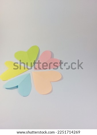 the shape of love from paper on a white background