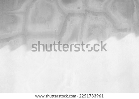 White Stucco Wall Background with Light and Shadow of Roof on the Surface.