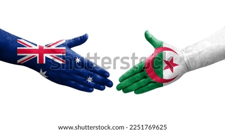 Handshake between Algeria and Australia flags painted on hands, isolated transparent image.