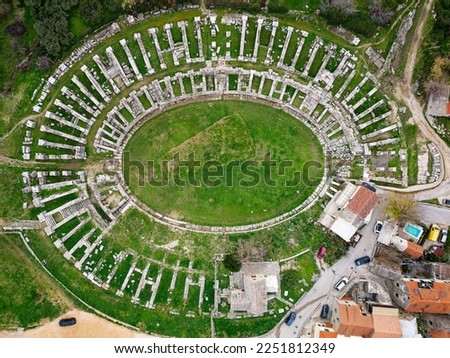 Aerial drone view of the Amphitheatre of Salona at Solin, Croatia.  Roman ruins. Places of historic interest. Travel and discover history and culture. Ruins and archaeological site.  Royalty-Free Stock Photo #2251812349