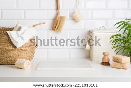 Marble stone podium for product display with eco cleaning items Royalty-Free Stock Photo #2251813101