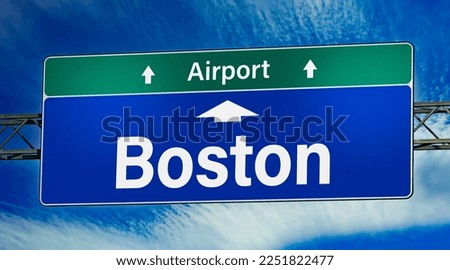 Road sign indicating direction to the city of Boston.