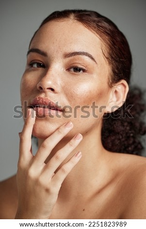 Face, sugar scrub and lips of woman in studio isolated on a gray background. Portrait, cosmetics and skincare of female model with lip dermatology product for exfoliation, cleaning and healthy skin. Royalty-Free Stock Photo #2251823989