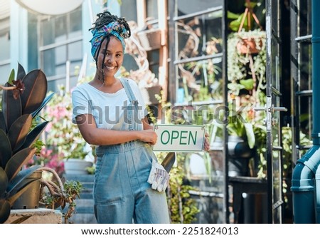Flowers, open sign and florist portrait of woman, startup small business owner or store manager with retail sales choice. Commerce shopping service, plant market or African worker with garden product