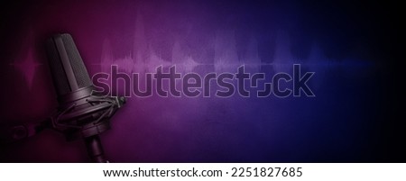Urban dark Podcast background with studio vocal microphone and audio waveform on pink and blue concrete backdrop texture. Recording studio banner with copy space for audio content