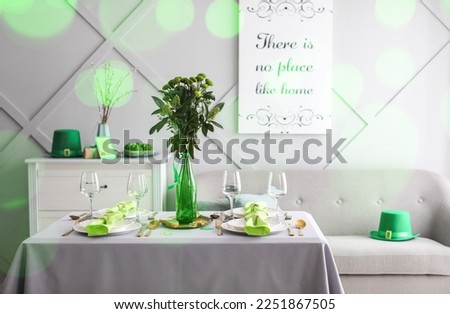 Stylish table setting for St. Patrick's Day celebration in dining room