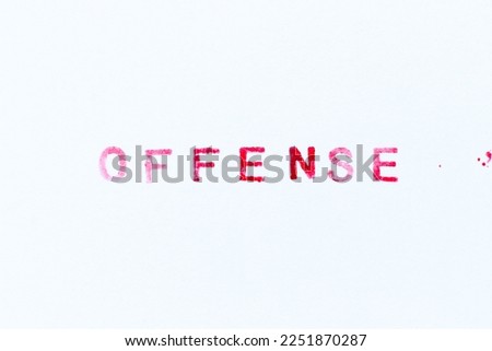 Red color ink rubber stamp in word offense on white paper background