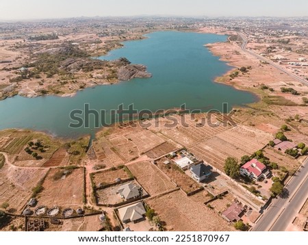 Establishment Drone Shot of an African Highway in a City Centre.
Natural Lake in a Town