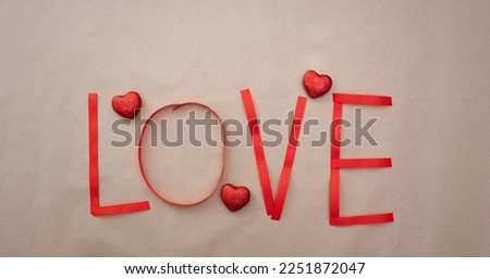 Valentine's Day background. Gifts, confetti. Valentine's day concept. Flat flat, top view, copy space.
