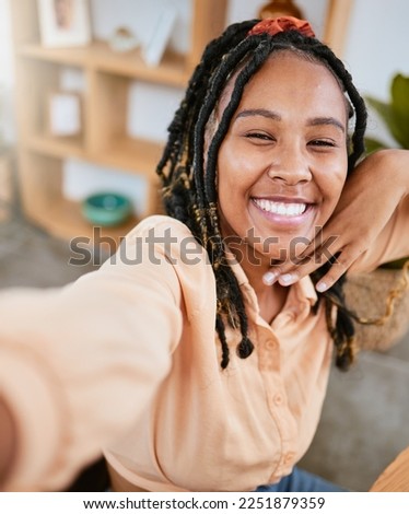 Selfie, smile and portrait of a beautiful woman relaxing, calm and content in a house. Happy, cute and face of a girl with a photo pose for happiness, confidence and empowerment in the morning
