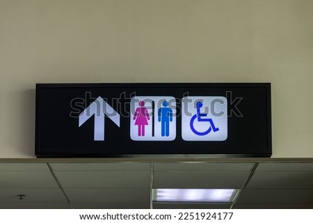 Sign of public toilets, men and lady. Symbols represent communication. Restroom sign on outdoor.