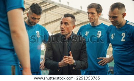 Professional Soccer Team Training, Tactical Coaching: Football Coach Explains Complex Game Strategy, Develop Workout Plan Trainer Motivates Athletes, Leads to Victory, Preparing For Championship. Royalty-Free Stock Photo #2251953765