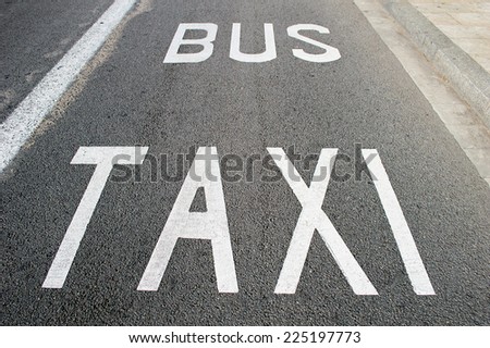 close up of taxi and bus lane 