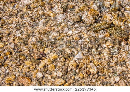 Yellow rocks in water