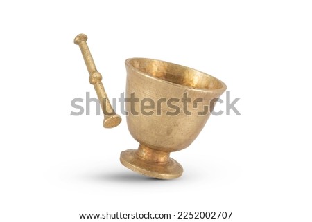 Antique brass mortar with pestle isolated on white background Royalty-Free Stock Photo #2252002707