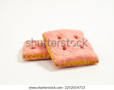 Dog treats. Treats for dogs on a white background. Dog food close-up. Royalty-Free Stock Photo #2252014713