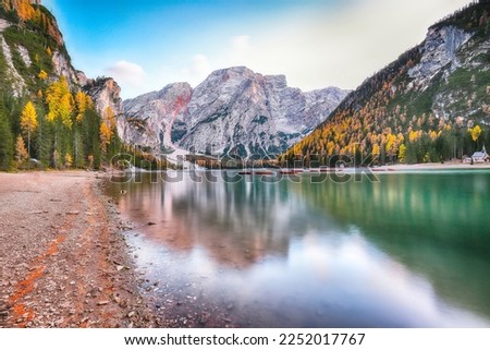 Outstanding scenery of famous alpine lake Braies at autumn. Location:  national park Fanes-Sennes-Braies, region Trentino-Alto Adige , province Bolzano, Italy, Europe
