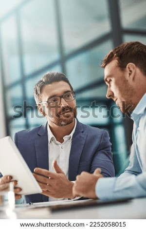 Coaching, training and business people with tablet in office workplace. Collaboration, mentor and men or employees with technology planning sales, marketing or advertising strategy in company meeting