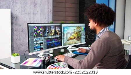 African American Video Editor Tech Job Using Computer