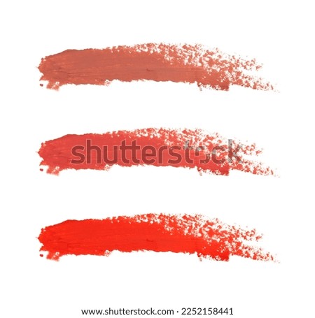 Color swatch smears of lipstick.