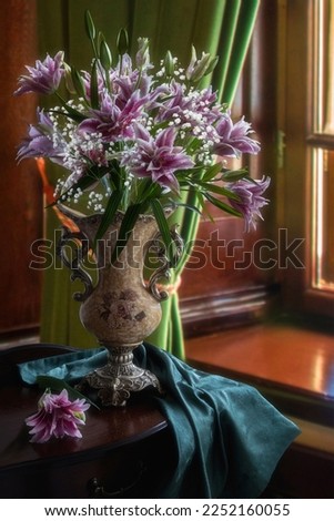 Still life with bouquet of pink lilies
