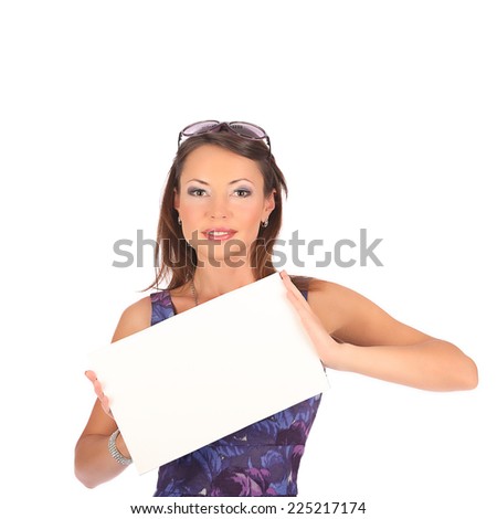 Portrait of woman holding a blank banner, studio