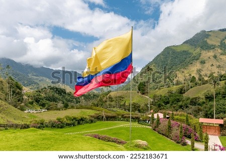 Colombian flag in the national park Royalty-Free Stock Photo #2252183671
