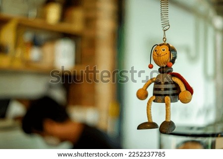 hanging doll decoration in a cafe