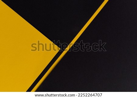 Black and yellow background divided with diagonal line Royalty-Free Stock Photo #2252264707