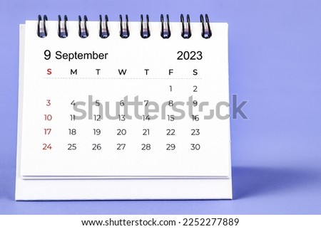 September 2023 Monthly desk calendar for 2023 year on purple background. Royalty-Free Stock Photo #2252277889