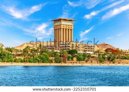 Aswan river bank view, buildings and hotels by the Nile, Egypt Royalty-Free Stock Photo #2252310701